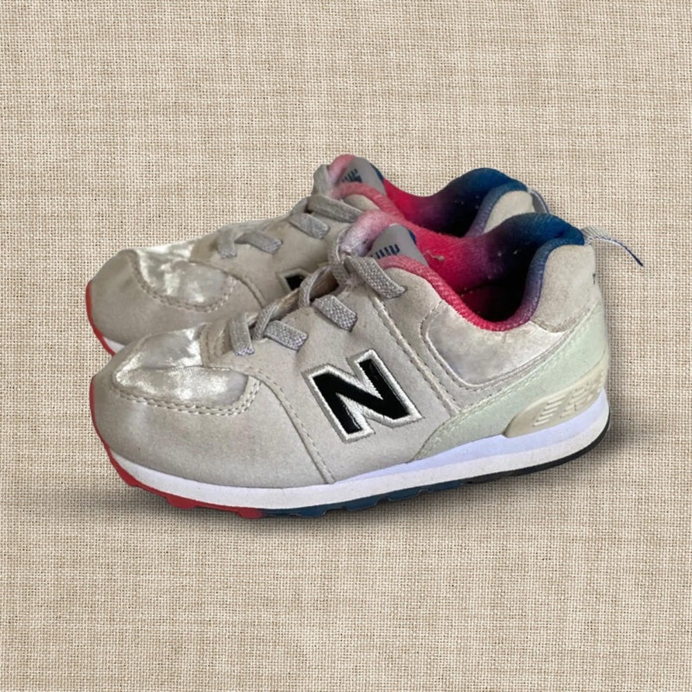 New Balance Kids Sneakers in Light Gray with Pink and Blue Accents